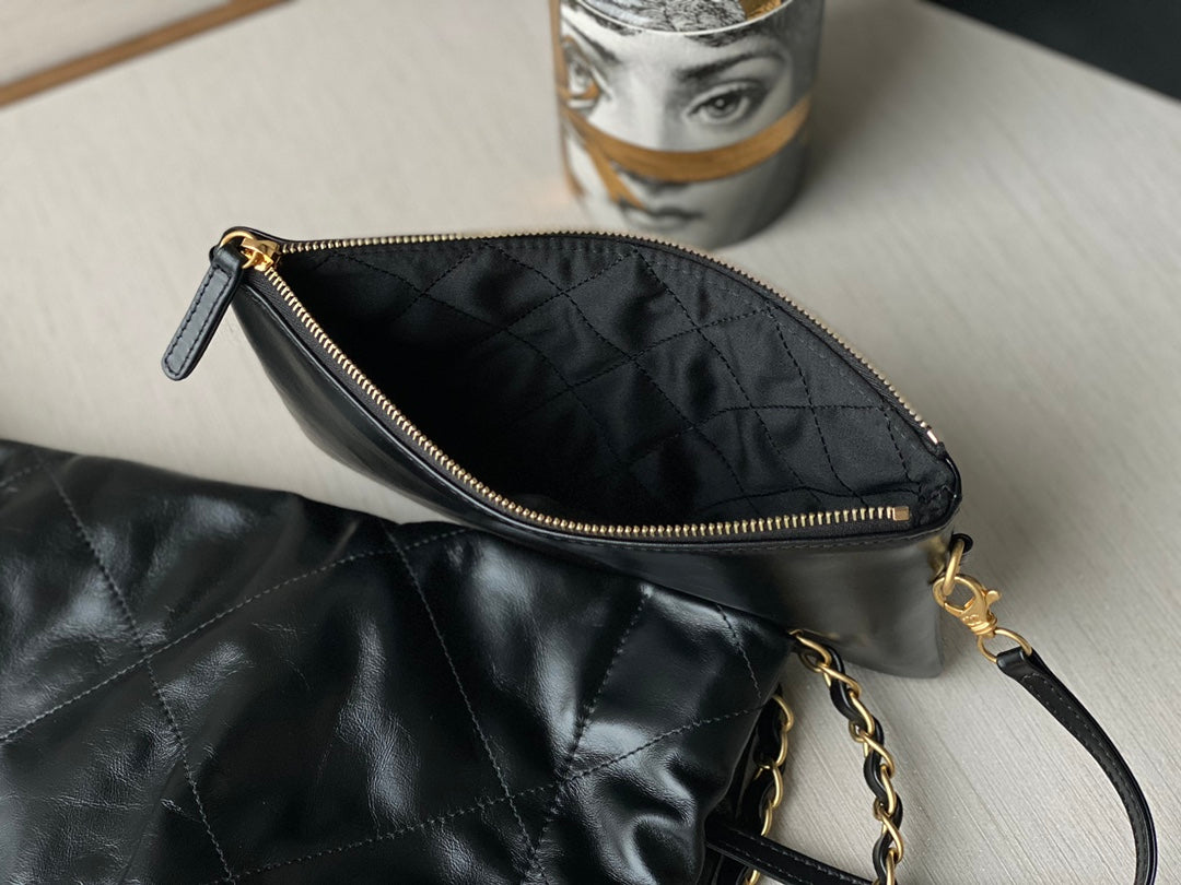 Chanel's new 22S classic diamond quilted and leather chain shoulder strap shopping bag