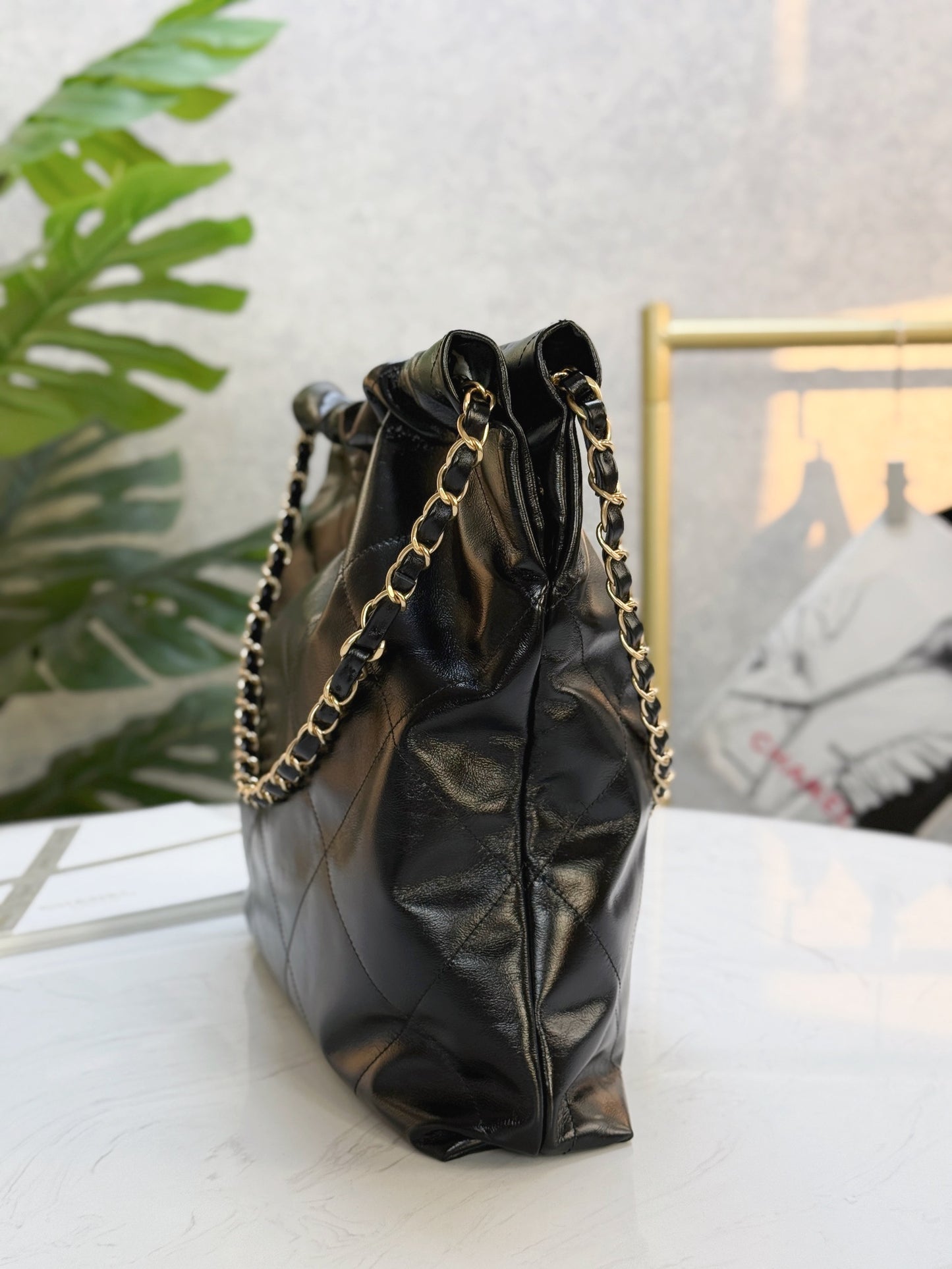 Chanel's new 22S classic diamond quilted and leather chain shoulder strap shopping bag