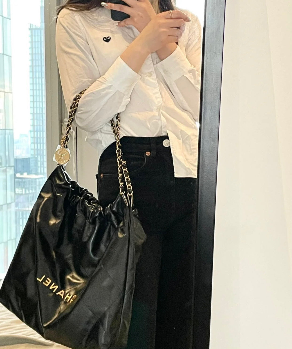 Chanel's new 22S classic diamond quilted and leather chain shoulder strap shopping bag