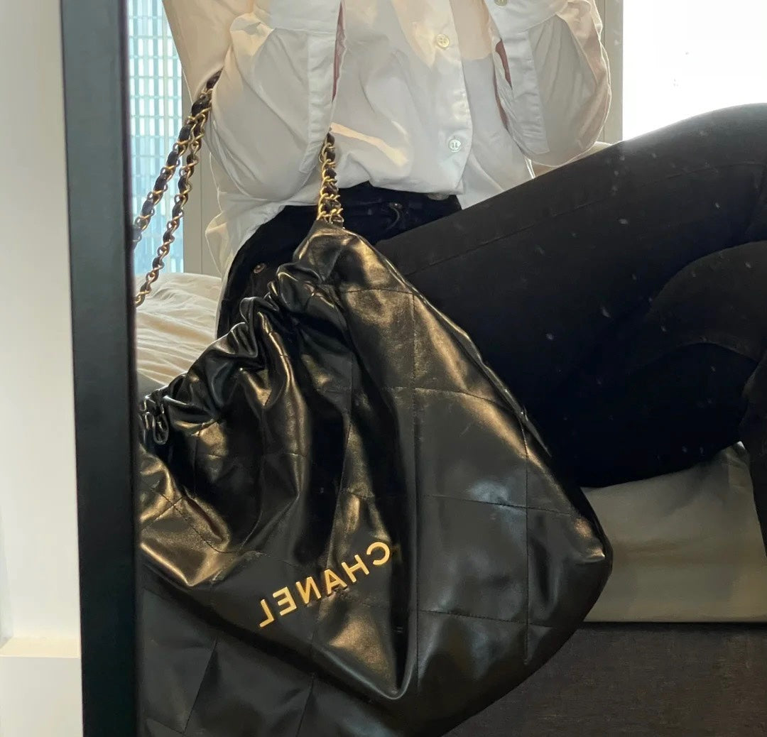 Chanel's new 22S classic diamond quilted and leather chain shoulder strap shopping bag