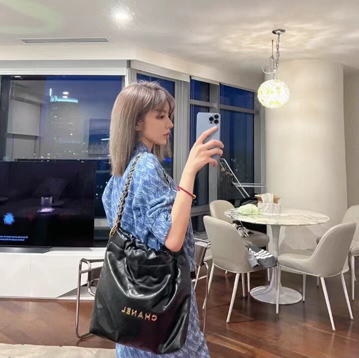 Chanel's new 22S classic diamond quilted and leather chain shoulder strap shopping bag