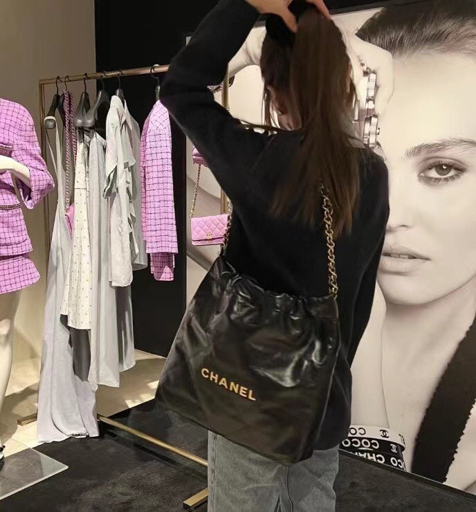 Chanel's new 22S classic diamond quilted and leather chain shoulder strap shopping bag