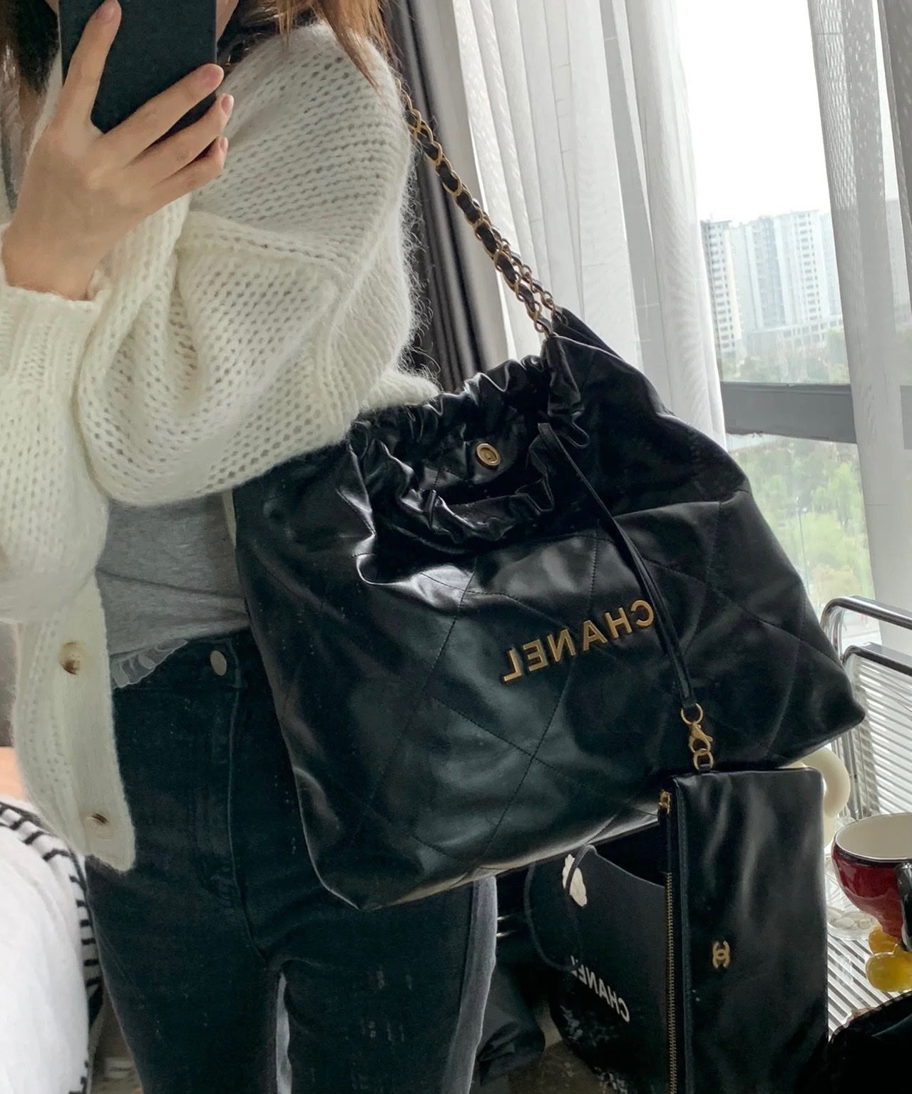 Chanel's new 22S classic diamond quilted and leather chain shoulder strap shopping bag